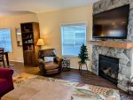 Reading chair, flat screen TV, and more to keep you entertained while you relax.